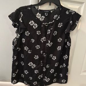 Women’s blouse black with white flowers